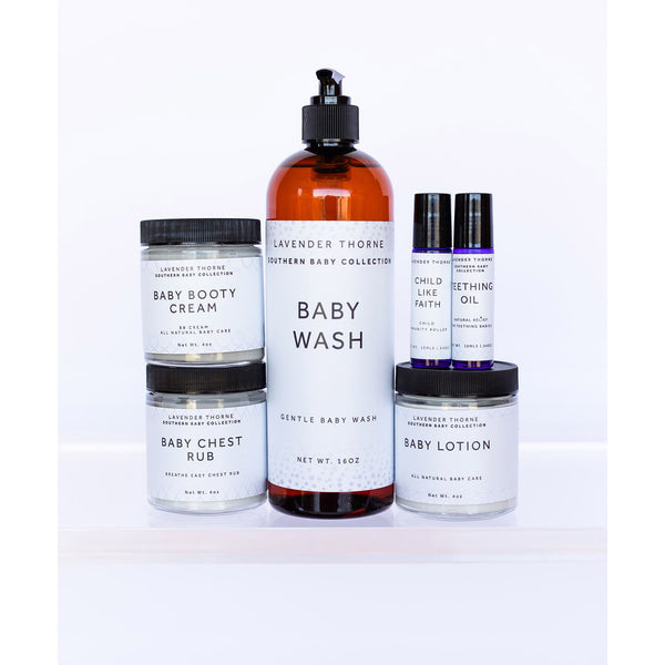 Collection of baby products, Baby wash, Baby check Rub, Baby Booty Cream, baby Tithing ili, baby lotion and child like faith, pictured in bottles and jars